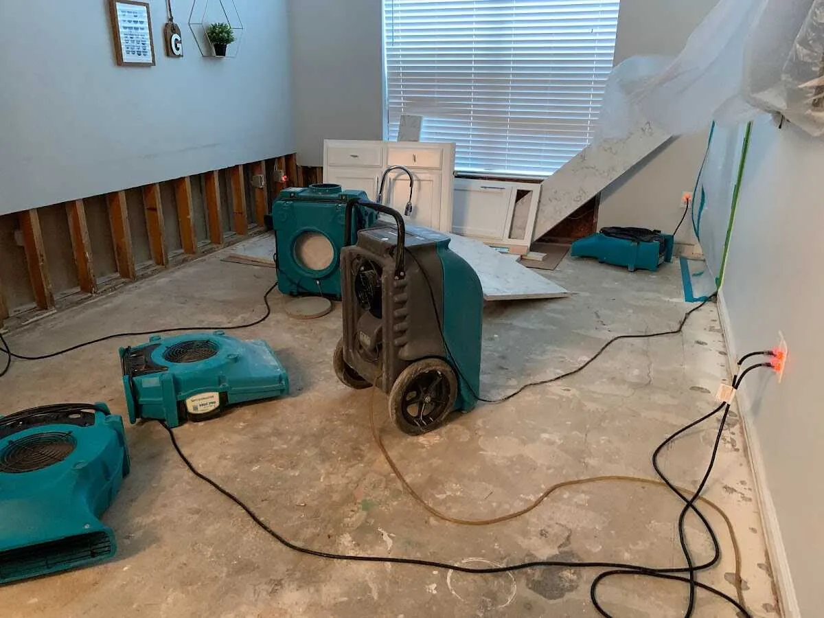 Dehumidifier in flood-cut room for Water Damage Restoration in La Junta